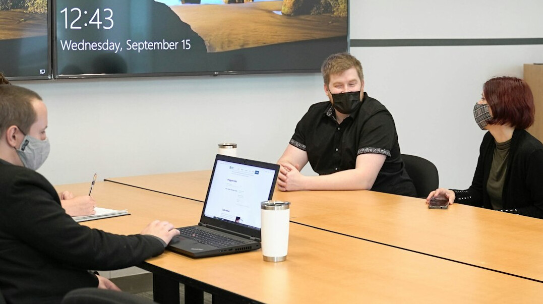 team discussing in conference room